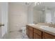 Double vanity bathroom with marble flooring and a shower at 2804 Grasmere View Pkwy, Kissimmee, FL 34746