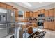 Modern kitchen with stainless steel appliances and an island at 3723 Madbury Cir, Lakeland, FL 33810