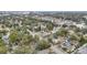 Wide aerial view showing the home and neighborhood at 209 W Highland St, Lakeland, FL 33803