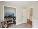 Spacious bedroom with built-in shelving and an adjacent bathroom at 209 W Highland St, Lakeland, FL 33803