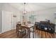 Dining area with four chairs and a kitchen view at 209 W Highland St, Lakeland, FL 33803