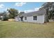 Gray house with a neatly landscaped front yard at 209 W Highland St, Lakeland, FL 33803