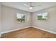 Bedroom with wood flooring, natural light, and ceiling fan at 683 Anderson Dr, Deltona, FL 32725