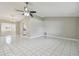 Spacious living room with abundant natural light and elegant tiled floors at 683 Anderson Dr, Deltona, FL 32725