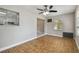 Cozy living room with tile floors, ceiling fan, and natural light, perfect for relaxation at 683 Anderson Dr, Deltona, FL 32725