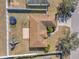 Aerial view of house with backyard, trampoline, and playset at 1371 Laurel Glen Dr, Bartow, FL 33830