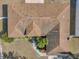 Top-down view of house roof and surrounding landscape at 1371 Laurel Glen Dr, Bartow, FL 33830