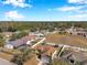 Aerial view of neighborhood with homes and yards at 1371 Laurel Glen Dr, Bartow, FL 33830