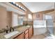 Bathroom features granite countertops, dual sinks, and a soaking tub at 1371 Laurel Glen Dr, Bartow, FL 33830