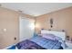 Bedroom with double bed, window, and closet at 1371 Laurel Glen Dr, Bartow, FL 33830