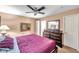 Main bedroom with king-size bed and large dresser at 1371 Laurel Glen Dr, Bartow, FL 33830