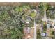 Aerial view showing home's location on a tree-lined street at 11730 Sw 230Th Avenue Rd, Dunnellon, FL 34431