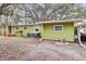 Exterior of home showing the backyard at 11730 Sw 230Th Avenue Rd, Dunnellon, FL 34431