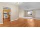 Dining room with hardwood floors and chandelier at 1309 Ballesteros Dr, The Villages, FL 32162