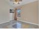 Well-lit bedroom with wood flooring and large window at 2160 Boardman Rd, Bartow, FL 33830