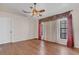 Spacious bedroom with hardwood floors and window coverings at 2160 Boardman Rd, Bartow, FL 33830