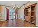 Bright dining room with wood floors and built-in hutch at 2160 Boardman Rd, Bartow, FL 33830