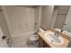 Clean bathroom featuring a tub, toilet and vanity at 30132 Pga Dr, Sorrento, FL 32776