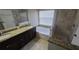 Double vanity bathroom with soaking tub and walk-in shower at 30132 Pga Dr, Sorrento, FL 32776