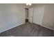 Spacious bedroom with plush carpeting and ample closet space at 30132 Pga Dr, Sorrento, FL 32776