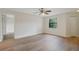 Spacious bedroom with ceiling fan and wood-look floors at 3036 Parkway Blvd # 206, Kissimmee, FL 34747