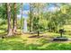 Relaxing picnic area by the pond with a water fountain at 3036 Parkway Blvd # 206, Kissimmee, FL 34747