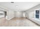 Open dining room area with tile flooring and access to kitchen at 5615 Driftwood Dr, Lakeland, FL 33809