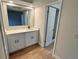 Modern bathroom with white cabinets and quartz countertop at 605 Aldama Ct, Ocoee, FL 34761