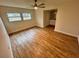 Bright bedroom with wood-look floors and ceiling fan at 605 Aldama Ct, Ocoee, FL 34761