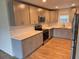 Modern kitchen with gray cabinets and quartz countertops at 605 Aldama Ct, Ocoee, FL 34761