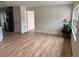 Bright living room with wood-look floors at 605 Aldama Ct, Ocoee, FL 34761