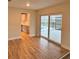 Living room with view of the pool and sliding glass doors to patio at 605 Aldama Ct, Ocoee, FL 34761