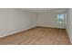 Large bonus room with carpeted floor and single window at 2204 Canyon Oak Dr, Davenport, FL 33837