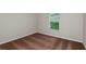 Spacious bedroom with brown carpet and large window at 2208 Canyon Oak Dr, Davenport, FL 33837