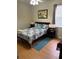 Cozy bedroom with carpet flooring, natural light, and comfortable decor at 113 Walton Heath Dr, Orlando, FL 32828