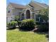 Attractive single-Gathering home with a lush front lawn and well-maintained landscaping at 113 Walton Heath Dr, Orlando, FL 32828