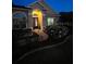 Inviting home exterior at dusk, featuring a welcoming entrance and manicured front yard at 113 Walton Heath Dr, Orlando, FL 32828