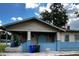 House exterior featuring a front porch and light blue painted brick at 1112 W 12Th St, Lakeland, FL 33805