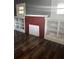 Brick fireplace with white trim and built-in shelving at 1112 W 12Th St, Lakeland, FL 33805