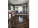 Living room with built-in shelving and a brick fireplace at 1112 W 12Th St, Lakeland, FL 33805