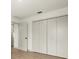 Clean bedroom features a built-in closet to maximize space and storage at 27100 Racquet Cir, Leesburg, FL 34748