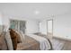 Spacious Primary bedroom with en-suite bathroom access at 27100 Racquet Cir, Leesburg, FL 34748