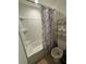Clean bathroom with a bathtub, toilet, and shower at 2793 Hudson St, Lakeland, FL 33810