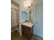 Bathroom with vanity, single sink, and mirror at 2793 Hudson St, Lakeland, FL 33810