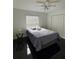 Bedroom with a full bed and gray bedding at 2793 Hudson St, Lakeland, FL 33810
