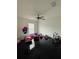 bedroom with toys and black tile floor at 2793 Hudson St, Lakeland, FL 33810