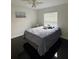 Bedroom with a full bed and gray bedding at 2793 Hudson St, Lakeland, FL 33810