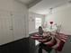 Elegant dining room featuring a glass table and six chairs at 2793 Hudson St, Lakeland, FL 33810