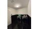 Bright laundry room with washer, dryer, and modern tile floors at 2793 Hudson St, Lakeland, FL 33810