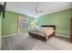 Spacious bedroom with carpeted floors and ceiling fan at 3096 Lansing Way, The Villages, FL 32162